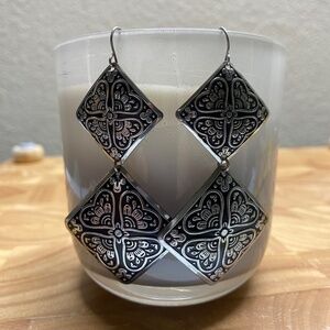 * dangle earrings with heart shape stamped metal Design